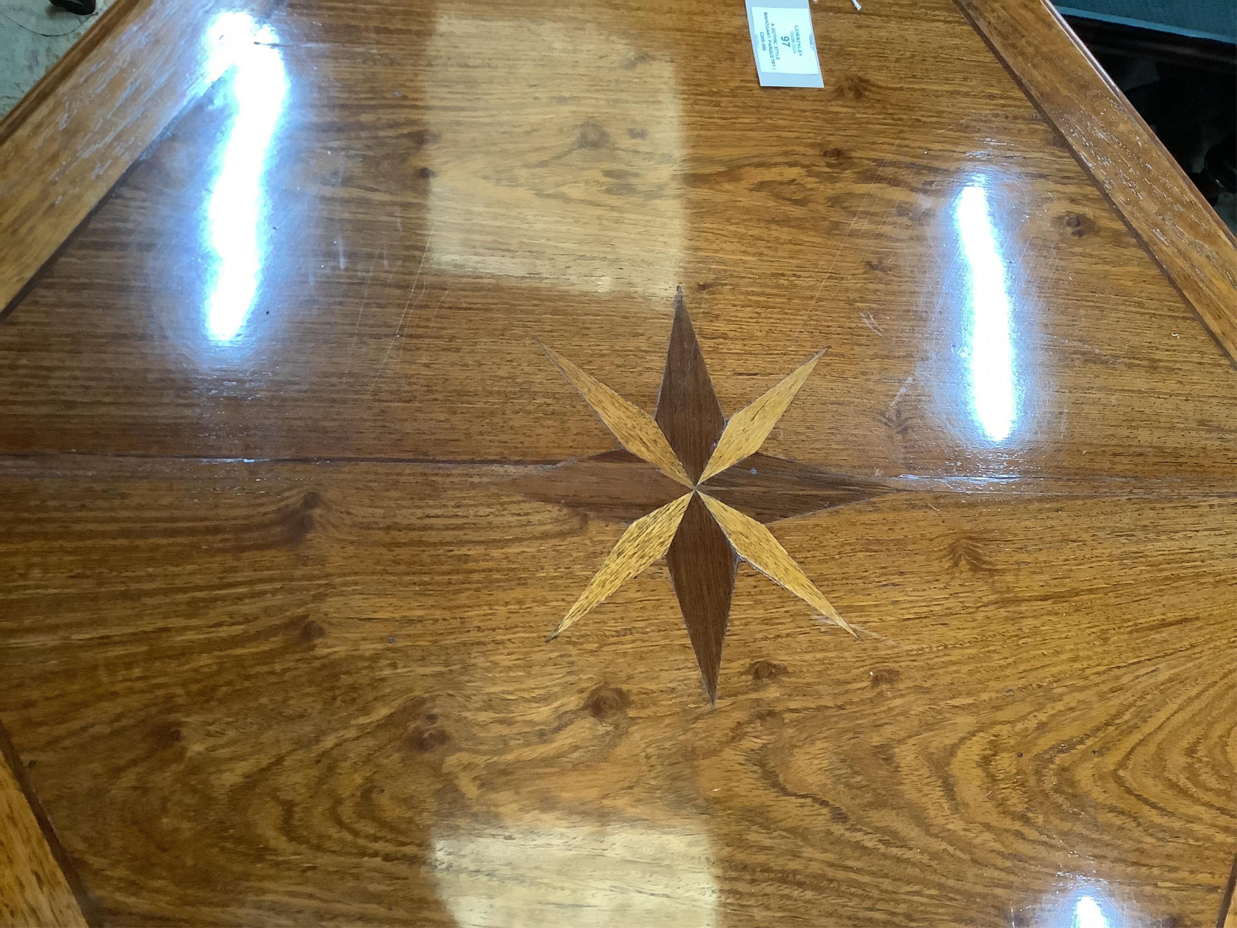 A Gothic style mahogany parquetry inlaid hexagonal centre table, width 81cm, height 75cm. Condition - fair